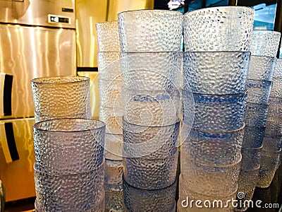 Closeup Plastic Cups with Fridge Backdrop Stock Photo
