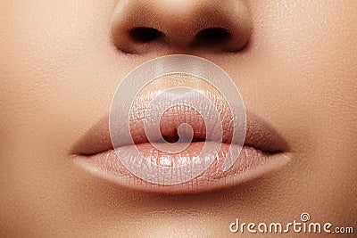 Closeup plump Lips. Lip Care, Augmentation, Fillers. Macro photo with Face detail. Natural shape with perfect contour Stock Photo