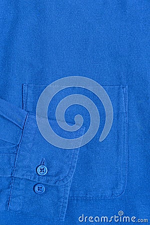 Closeup pocket and sleeve of blue fabric shirt Stock Photo