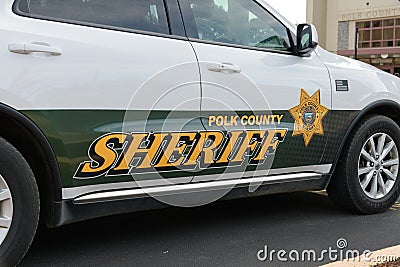 Closeup of Polk County sheriff vehicle with name and badge Editorial Stock Photo