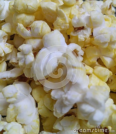 Closeup of popcorns with melted butter, food photography, snacks background Stock Photo