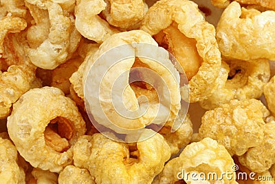 Closeup of pork snack or pork rinds, deep fried pork skin and blistered is traditional food in the north of Thailand Stock Photo