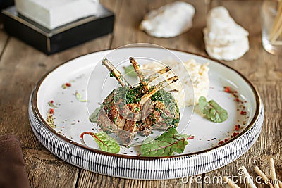 Portion of gourmet lamb cutlets with rice Stock Photo