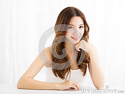 Closeup portrait of attractive young woman smiling Stock Photo