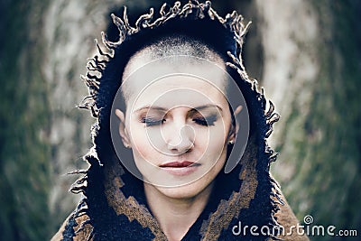 Closeup portrait of beautiful Caucasian white young bald girl woman with shaved hair head with closed eyes Stock Photo