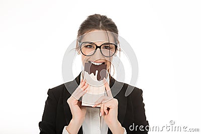 Woman chocolate eating smiling happy looking at camera Stock Photo