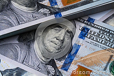 Closeup portrait Benjamin Franklin on 100 us dollar bill. Stock Photo