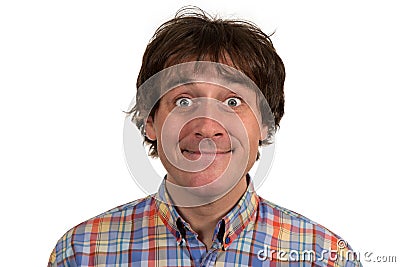 Closeup portrait of confused young man in checkered shirt. Stock Photo