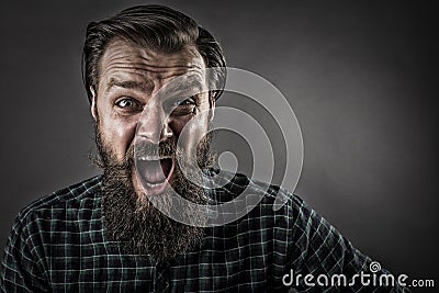 Closeup portrait of a furious man yelling Stock Photo