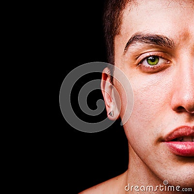 Closeup portrait - half face of masculine man Stock Photo