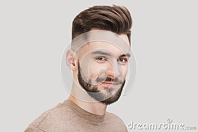Closeup portrait of handsome smiling young man, Cheerful men isolated on gray background studio sho Stock Photo