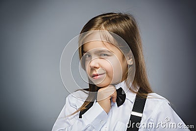 Closeup Portrait of mistrust girl isolated on gray background Stock Photo