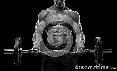 Closeup portrait of a muscular man workout with barbell at gym Stock Photo