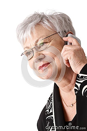 Closeup portrait of older woman with mobile phone Stock Photo