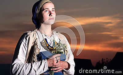 Closeup portrait of slavic woman from the past. Historical reconstruction Stock Photo