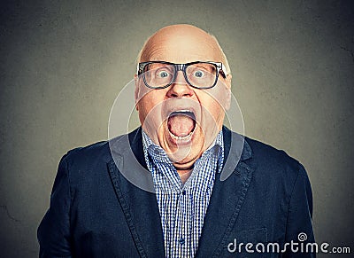 Closeup portrait surprised senior man Stock Photo