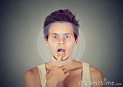 Closeup portrait surprised young man Stock Photo