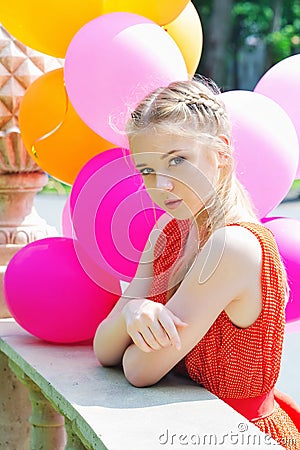 Closeup portrait of tender teenager with balloons Stock Photo