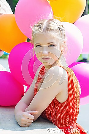 Closeup portrait of tender teenager with balloons Stock Photo