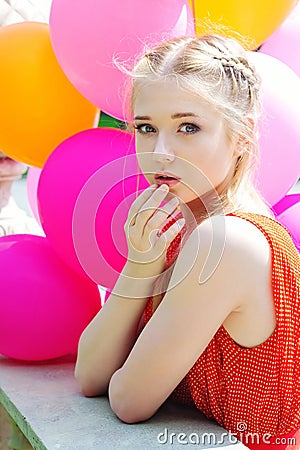 Closeup portrait of tender teenager with balloons Stock Photo
