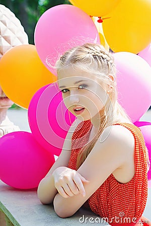 Closeup portrait of tender teenager with balloons Stock Photo