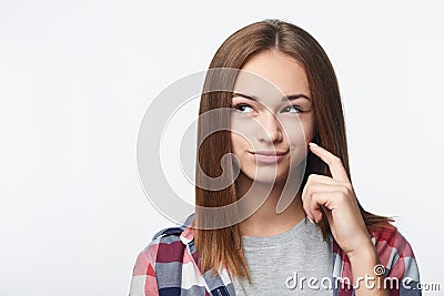 Closeup portrait of thinking teen girl looking to side Stock Photo