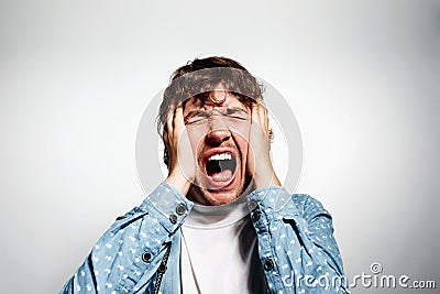 Closeup portrait upset stressed young man Stock Photo