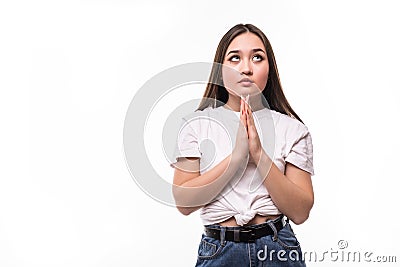 Portrait of asian woman praying hoping for the best, isolated on white background with copy space Stock Photo