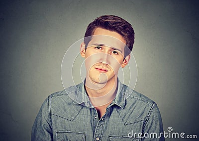 Closeup portrait of young bored man Stock Photo