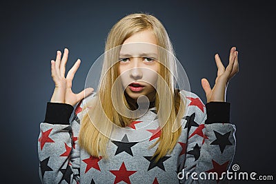 Closeup portrait young unsure hesitant nervous girl on gray Stock Photo