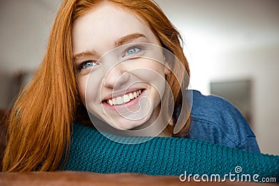 Closeup of positive young redhead woman Stock Photo