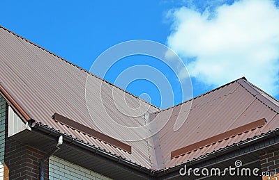 Closeup of problem areas for rain gutter, roof waterproofing and roof protection from snow board (Snow guard) Stock Photo