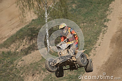 Closeup of quad rider in high jumping Editorial Stock Photo