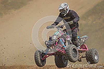 Closeup of quad rider in a jump Editorial Stock Photo