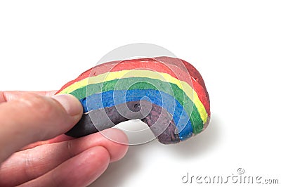 rainbow on stone pebble on white background Stock Photo