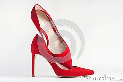 Closeup of red high heels on white background Stock Photo