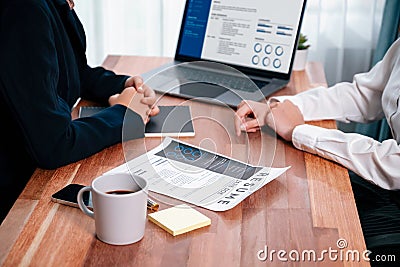 Closeup resume paper with qualifications on desk during interview. Enthusiastic Stock Photo