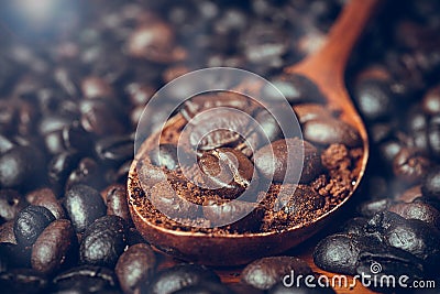 Closeup Roasted coffee beans in the wooden spoon Stock Photo