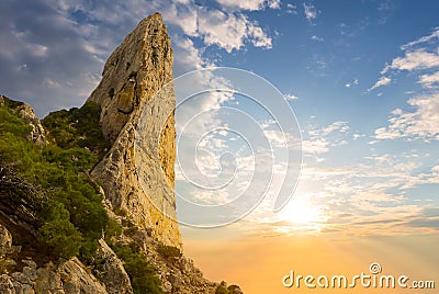 Closeup rocky mount top on dramatic sunset background Stock Photo