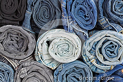 Closeup rolled of blue jeans pants, dark blue denim trousers Stock Photo