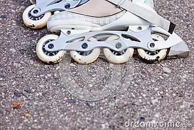 Closeup roller skates on asphalt. Stock Photo