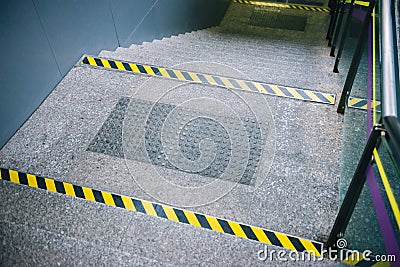 Closeup rough tactile surface for blind handicap before up or down to train station. Stock Photo