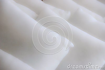 Closeup of rows of white fluffy pillows Stock Photo