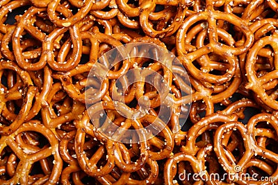 Closeup salted pretzel seamless background Stock Photo
