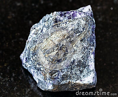 Rough Stibnite Antimonite ore on black Stock Photo