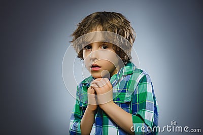 Closeup Scared and shocked little boys. Human emotion face expression Stock Photo