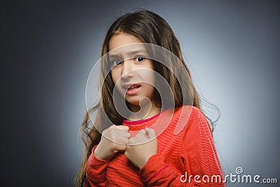 Closeup Scared and shocked little girl. Human emotion face expression Stock Photo