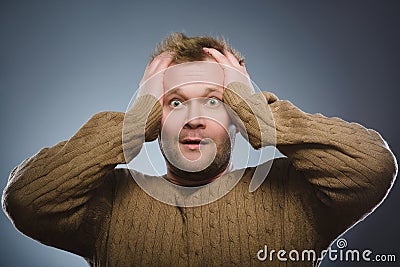 Closeup Scared and shocked man. Human emotion face expression Stock Photo