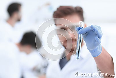 Closeup. scientist with beaker Stock Photo