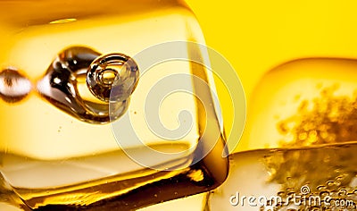 Closeup of scotch whiskey in glass with ice cubes on white Stock Photo